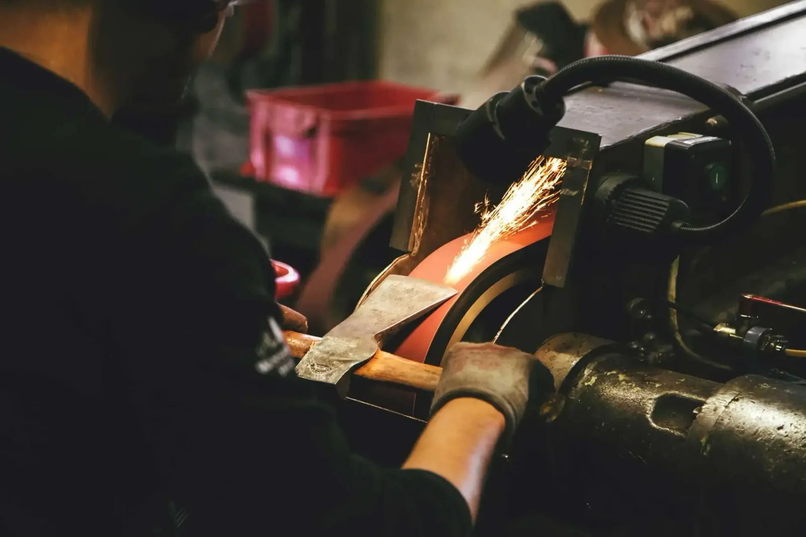 Sharpening an axe — Photo by C D-X on Unsplash