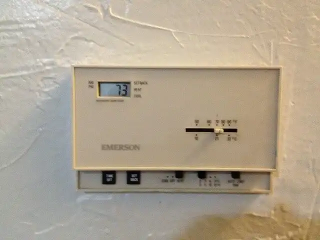 Old thermostat before Nest